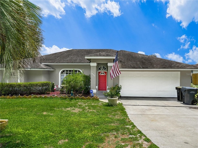 ranch-style house with a front lawn and a garage