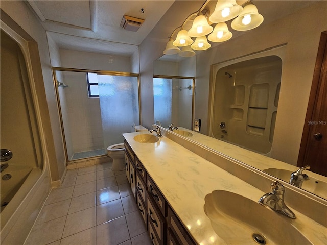full bathroom with vanity, toilet, plus walk in shower, and tile patterned flooring