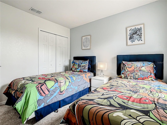 carpeted bedroom featuring a closet