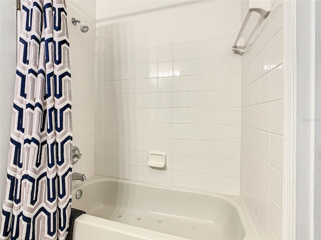 bathroom featuring shower / bath combo with shower curtain