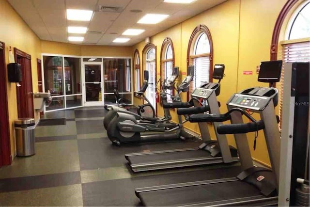 gym with a drop ceiling