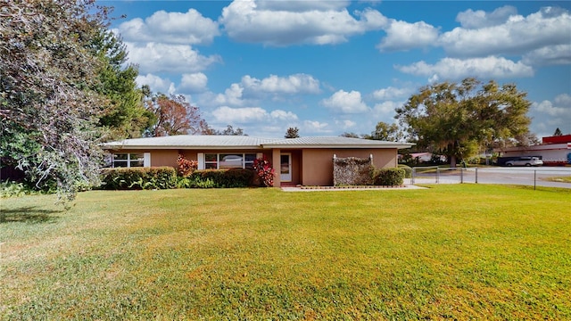 ranch-style house with a front yard