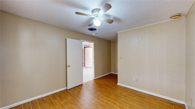 unfurnished room featuring ceiling fan and light hardwood / wood-style floors