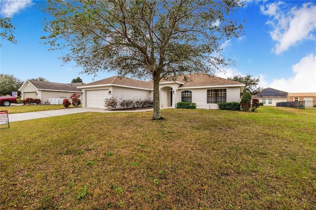 ranch-style house with a front yard and a garage