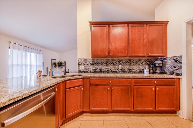 kitchen featuring dishwasher, light stone counters, decorative backsplash, and sink