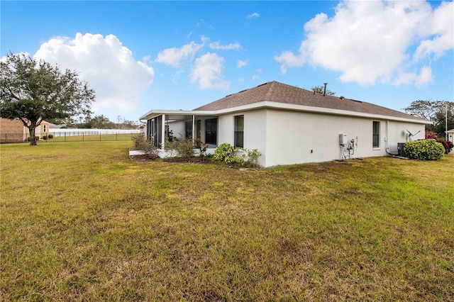 view of property exterior featuring a yard