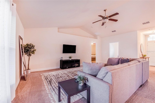 living room featuring visible vents, light colored carpet, ceiling fan, and vaulted ceiling