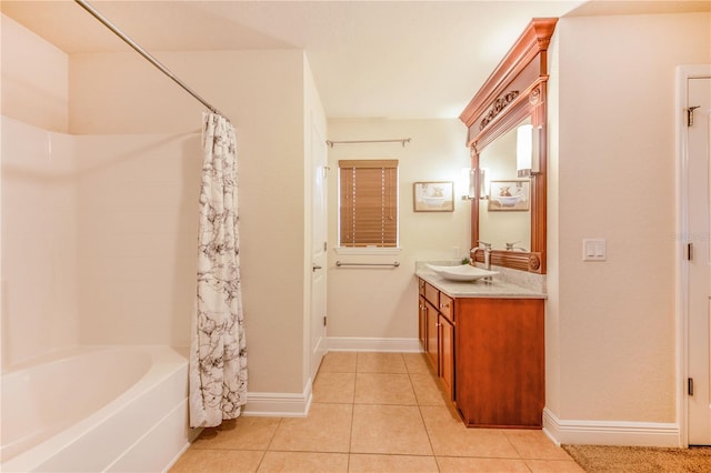 full bathroom with vanity, tile patterned floors, shower / bath combo, and baseboards