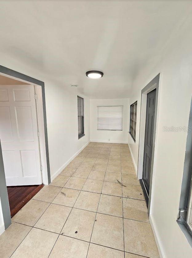 1414 Johns Ave, Haines City, FL 33844 - hall with light tile floors