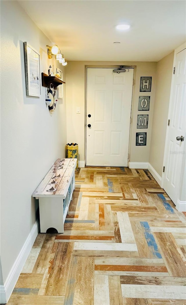 doorway with light parquet floors