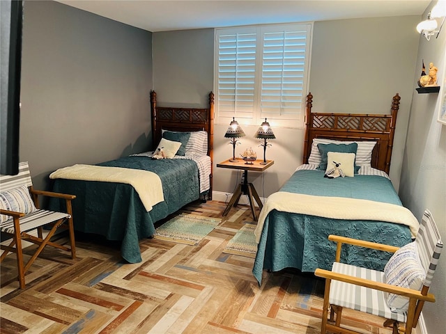 bedroom featuring parquet floors