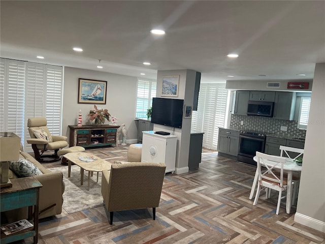 living room with parquet floors