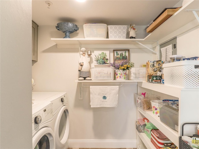 washroom with independent washer and dryer