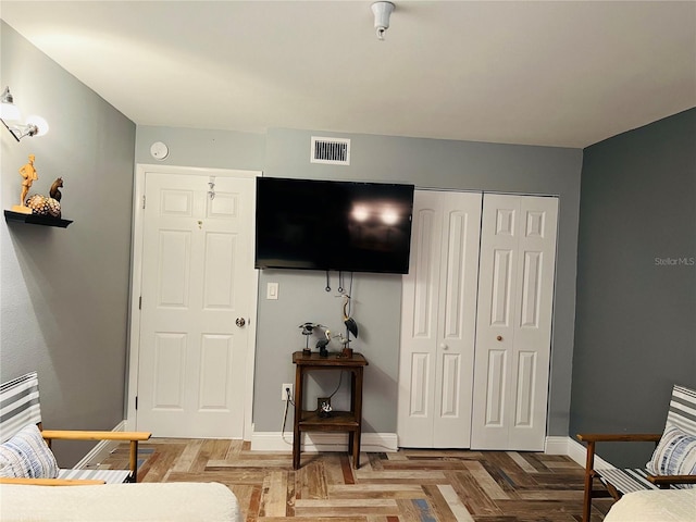 living room with parquet floors