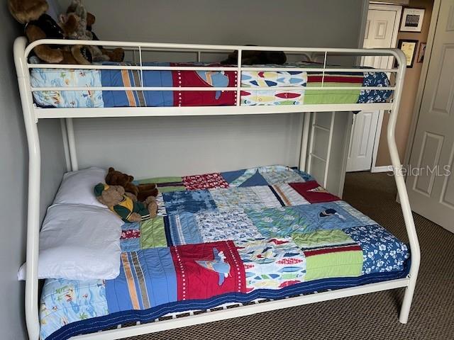 bedroom featuring carpet flooring