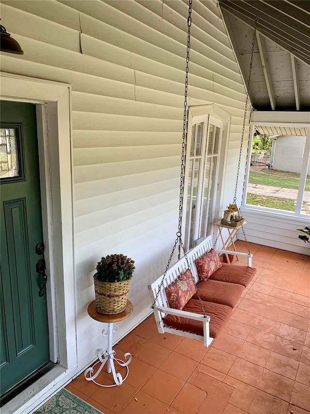 exterior space featuring lofted ceiling