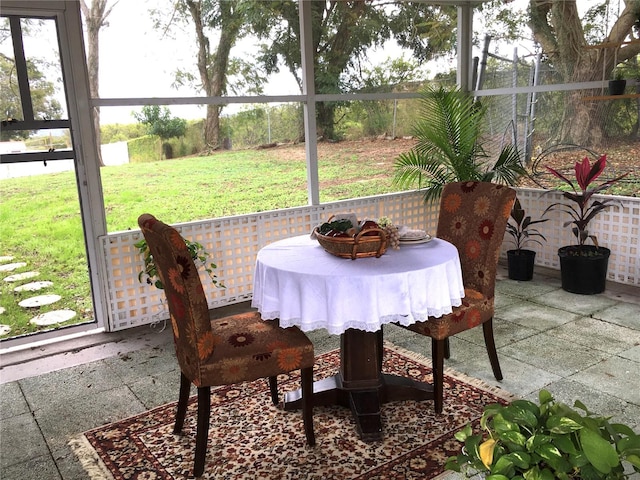 sunroom / solarium with a healthy amount of sunlight