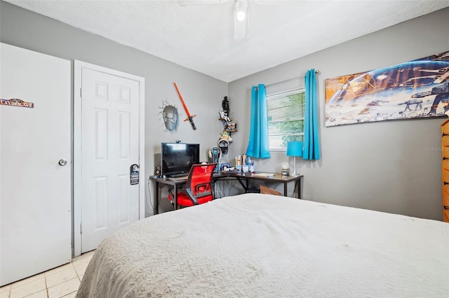 bedroom featuring tile flooring and ceiling fan