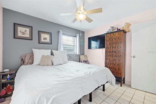 bedroom with ceiling fan and light tile floors