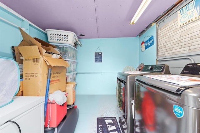 laundry area featuring washing machine and dryer