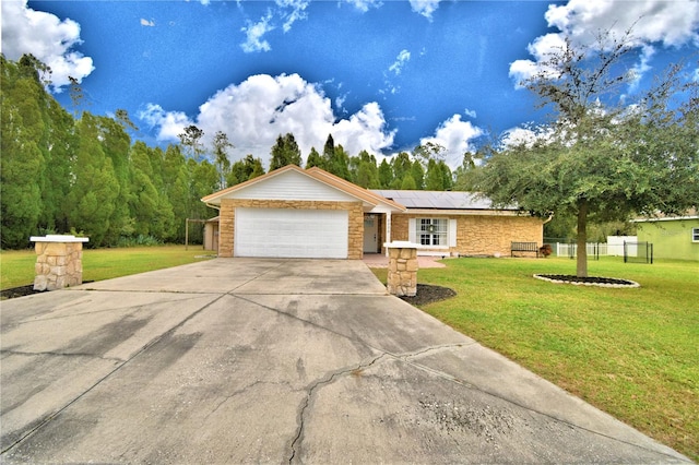 ranch-style home with a front lawn, a garage, and solar panels