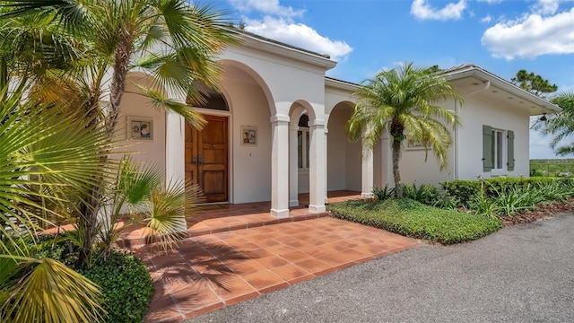 2300 N Scenic Hwy Unit 111, Lake Wales, FL 33898 - view of exterior entry with stucco siding
