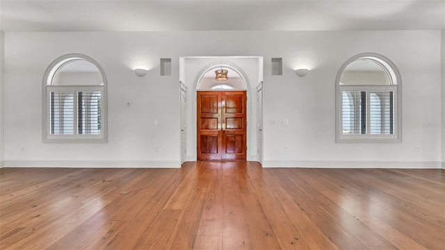 2300 N Scenic Hwy Unit 111, Lake Wales, FL 33898 - foyer with plenty of natural light and hardwood / wood-style floors