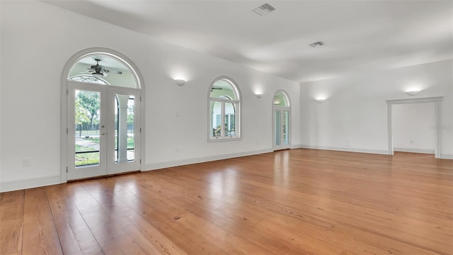 2300 N Scenic Hwy Unit 111, Lake Wales, FL 33898 - unfurnished living room with light wood-style floors and a ceiling fan