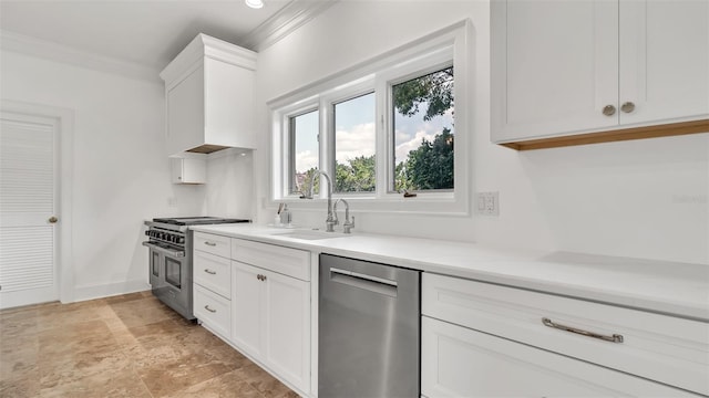 2300 N Scenic Hwy Unit 111, Lake Wales, FL 33898 - kitchen featuring stainless steel appliances, white cabinetry, ornamental molding, light countertops, and premium range hood
