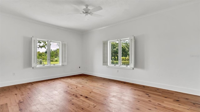 2300 N Scenic Hwy Unit 111, Lake Wales, FL 33898 - empty room featuring wood-type flooring, ornamental molding, and a ceiling fan