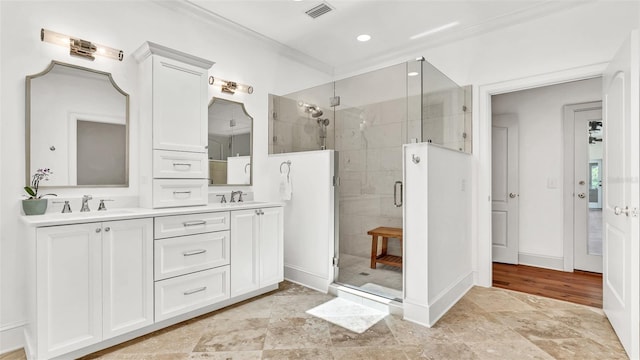 2300 N Scenic Hwy Unit 111, Lake Wales, FL 33898 - full bath with ornamental molding, double vanity, a shower stall, recessed lighting, and stone finish flooring