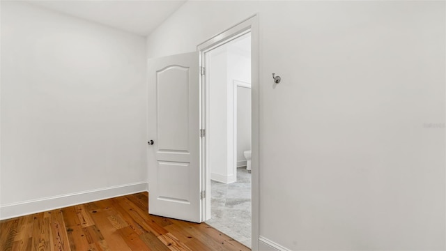 2300 N Scenic Hwy Unit 111, Lake Wales, FL 33898 - empty room with light wood finished floors and baseboards