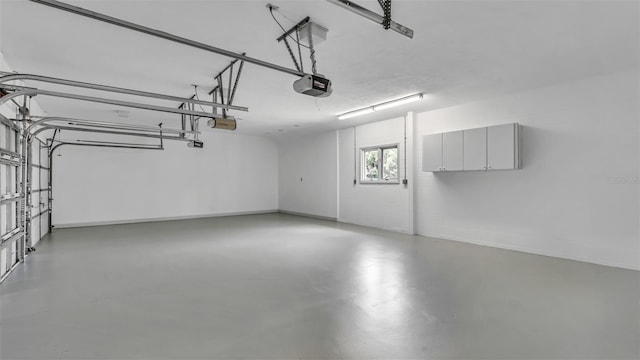 2300 N Scenic Hwy Unit 111, Lake Wales, FL 33898 - garage with a garage door opener