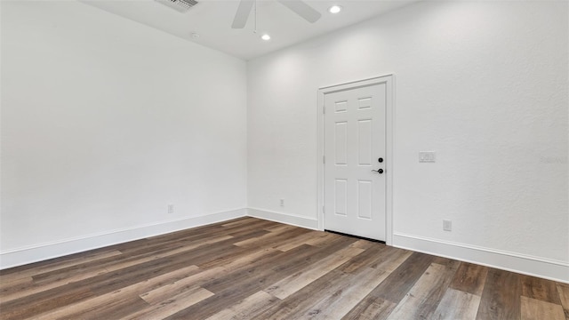 2300 N Scenic Hwy Unit 111, Lake Wales, FL 33898 - empty room with wood finished floors, ceiling fan, and recessed lighting