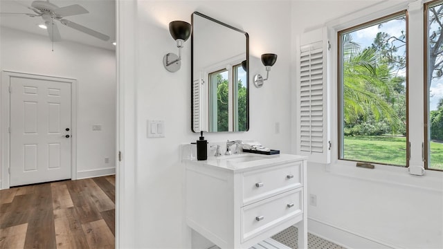 2300 N Scenic Hwy Unit 111, Lake Wales, FL 33898 - bathroom featuring ceiling fan, vanity, and wood finished floors