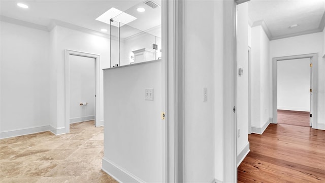 2300 N Scenic Hwy Unit 111, Lake Wales, FL 33898 - hallway featuring ornamental molding, recessed lighting, and a skylight