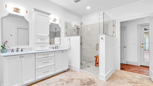 2300 N Scenic Hwy Unit 111, Lake Wales, FL 33898 - full bath featuring crown molding, double vanity, a stall shower, and recessed lighting