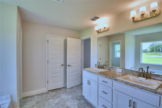 bathroom featuring vanity