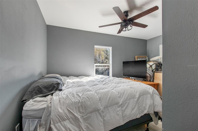 bedroom featuring ceiling fan