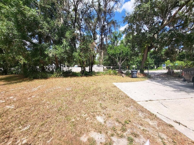 4450 Old Berkley Rd, Auburndale, FL 33823 - view of yard with view of wooded area