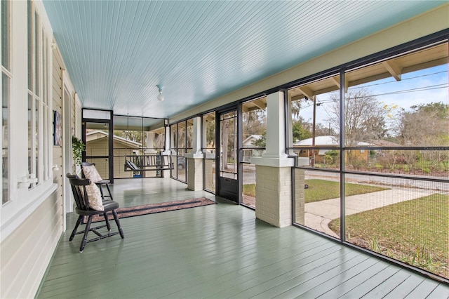 view of unfurnished sunroom