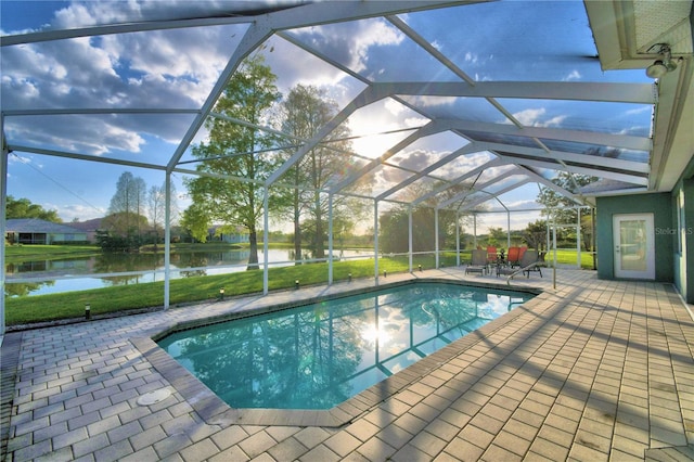 view of swimming pool with a lanai and a patio area