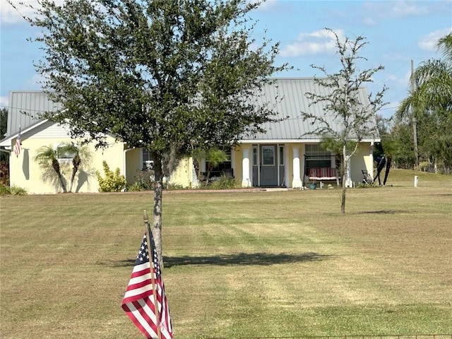 view of front of house with a front yard