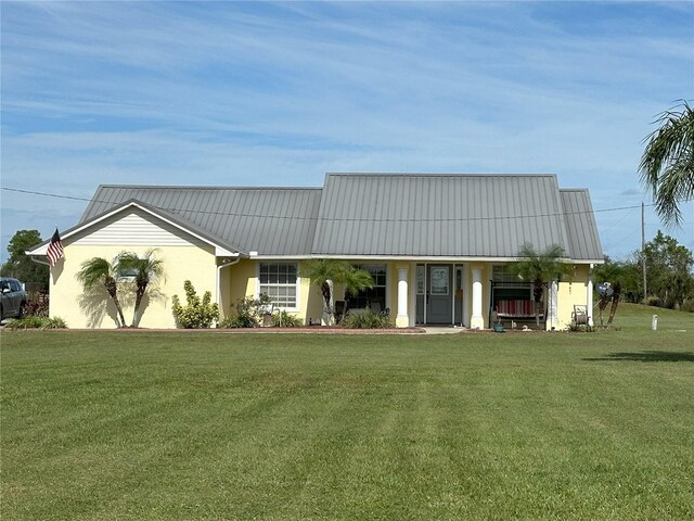 view of front of home with a front yard