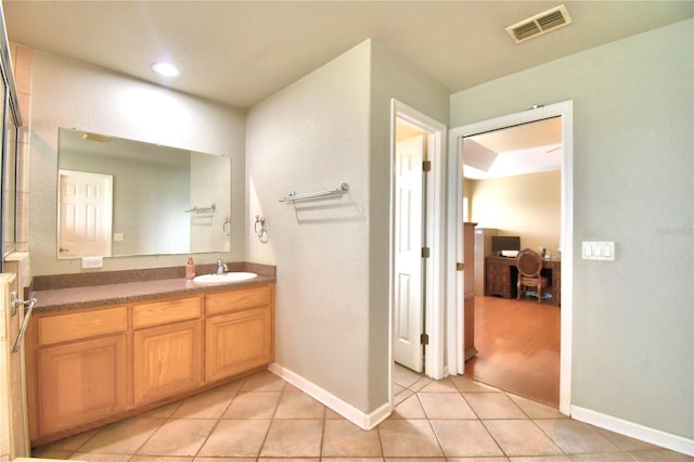 bathroom featuring vanity and tile patterned floors