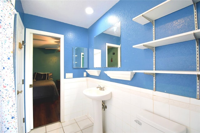 bathroom featuring tile walls and tile patterned floors