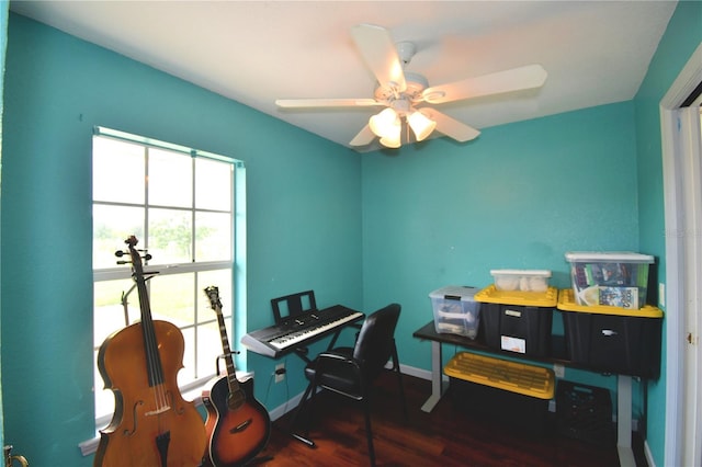 office featuring dark hardwood / wood-style floors and ceiling fan