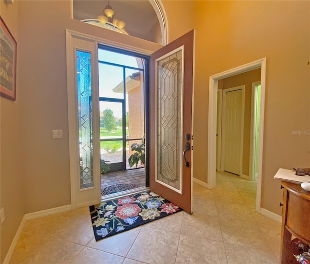 tiled foyer entrance featuring a healthy amount of sunlight