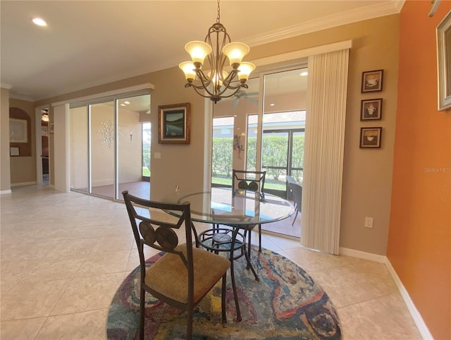 dining space featuring light tile patterned floors, a chandelier, and ornamental molding