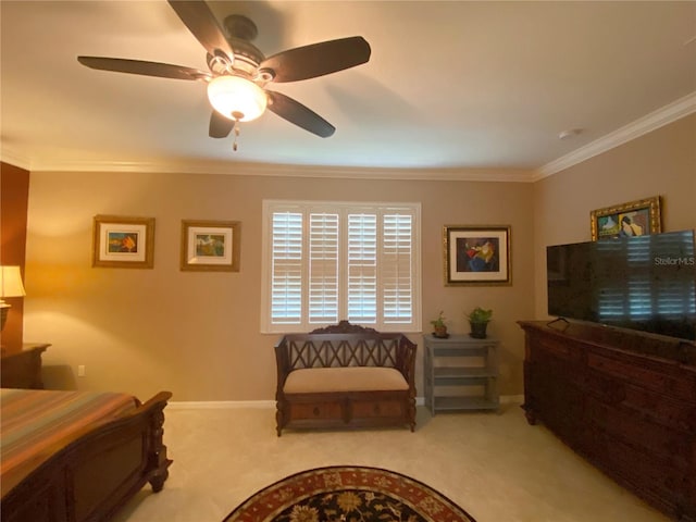 bedroom with light carpet, ceiling fan, and crown molding